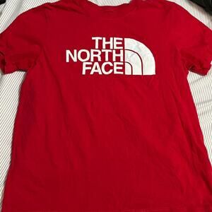 Red the north face t shirt